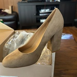 Just fab nude pumps. Never worn. 5.5 size.